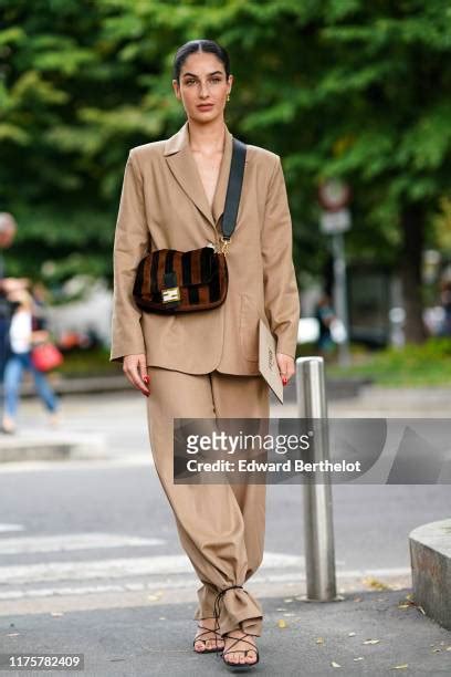 fiona zanetti fendi|Fiona Zanetti wears a light brown blazer jacket, pants, a brown.